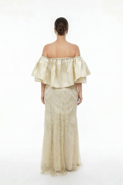 فستان سهرة بمقاسات كبيرة مزين بالترتر بلون العظم